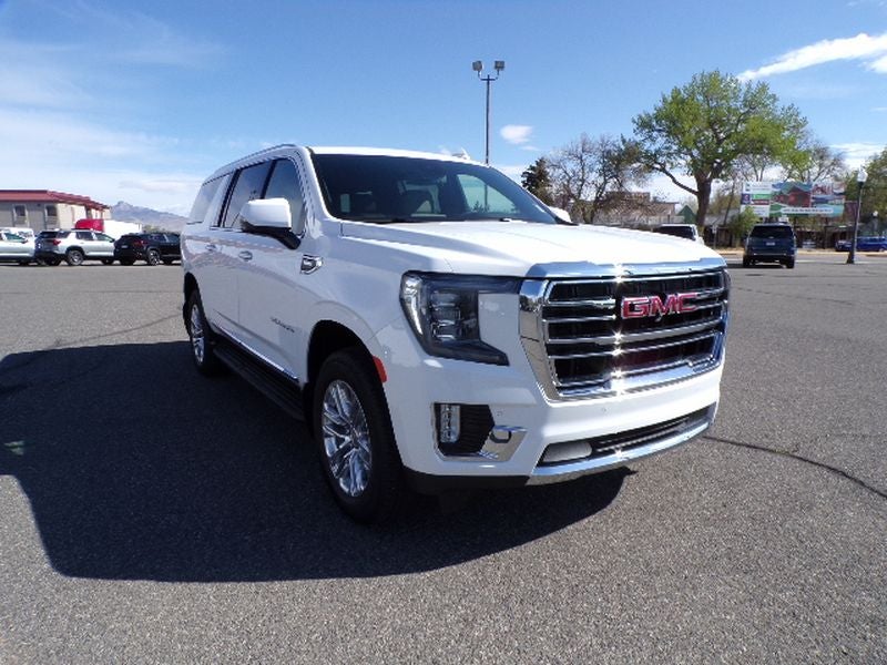 2024 GMC Yukon XL SLT in Summit White — front three-quarter view
