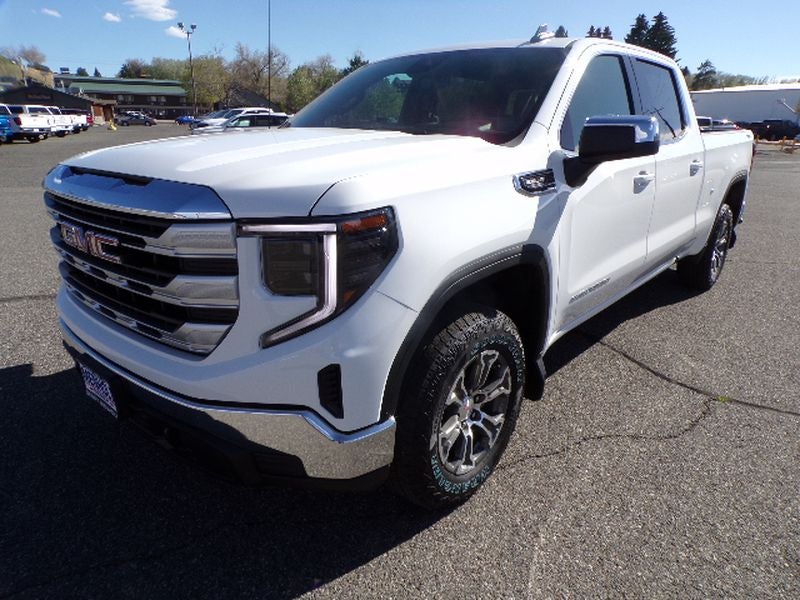 2026 GMC Sierra 1500 SLE in Summit White — front three-quarter view