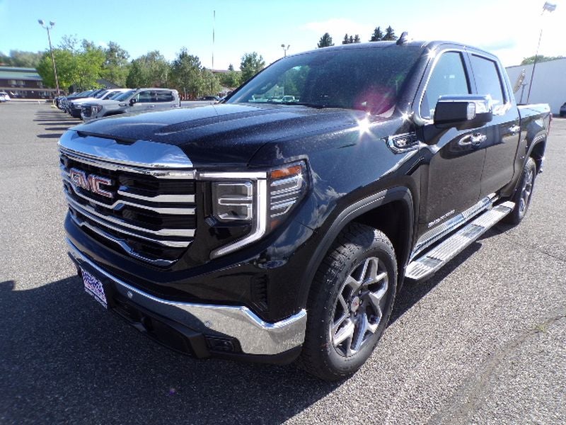 2026 GMC Sierra 1500 SLT in Onyx Black — front three-quarter view