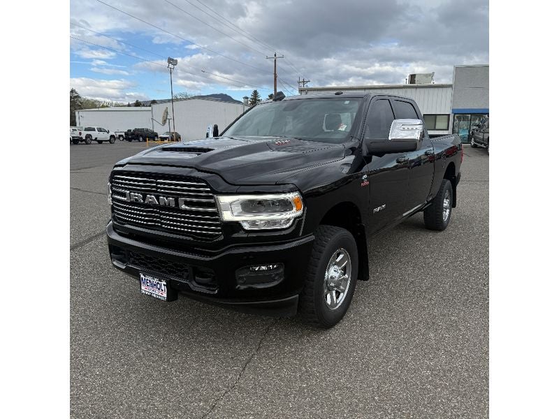 2023 RAM 2500 Laramie in Black — front three-quarter view